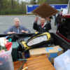 Nancy Krajewski, left, and her husband Steve begin to unload their pick-up truck full of stuff as they arrive at Clear Your Clutter Day Saturday at Harford Community College.